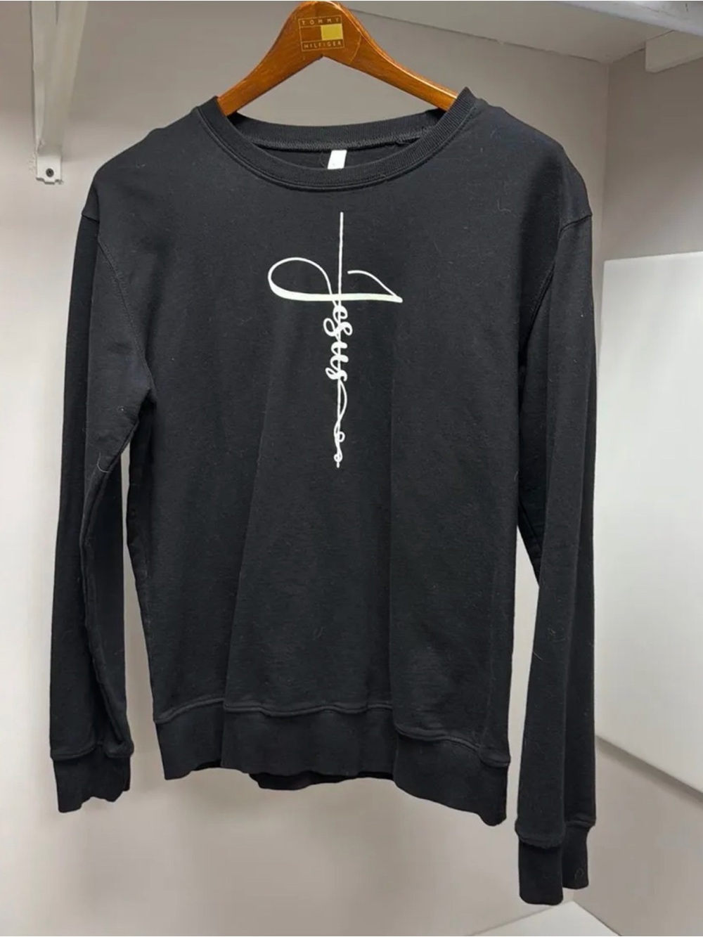 Black Crewneck Sweatshirt with White Cross Script Graphic